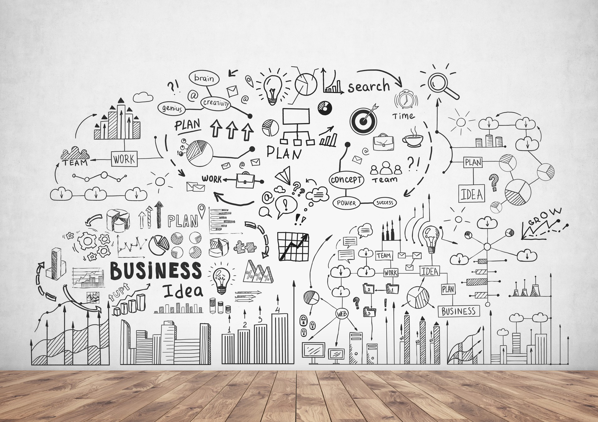 Business stategy sketch on a concete wall